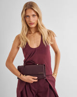 Katie Loxton Alma Clutch – Cherry Patent Crackle