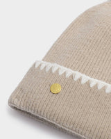 Katie Loxton Whipstitch Pom Pom Hat – Taupe