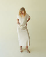 CHALK Maeve Satin Bias Midi Skirt in Champagne